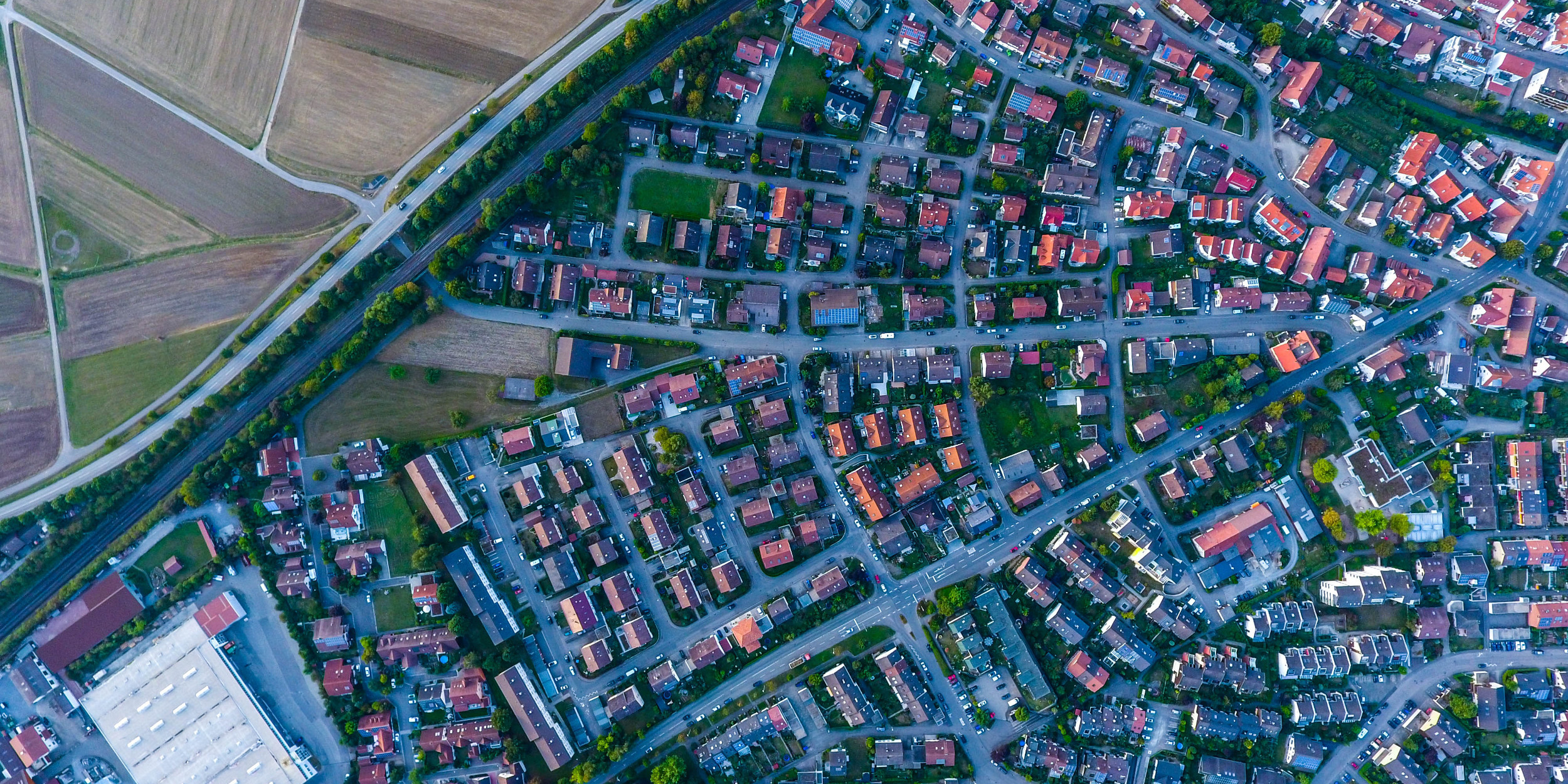 Image: Contrast between highly dense and rural areas in Ehningen, Germany. Max Böttinger, Unsplash.